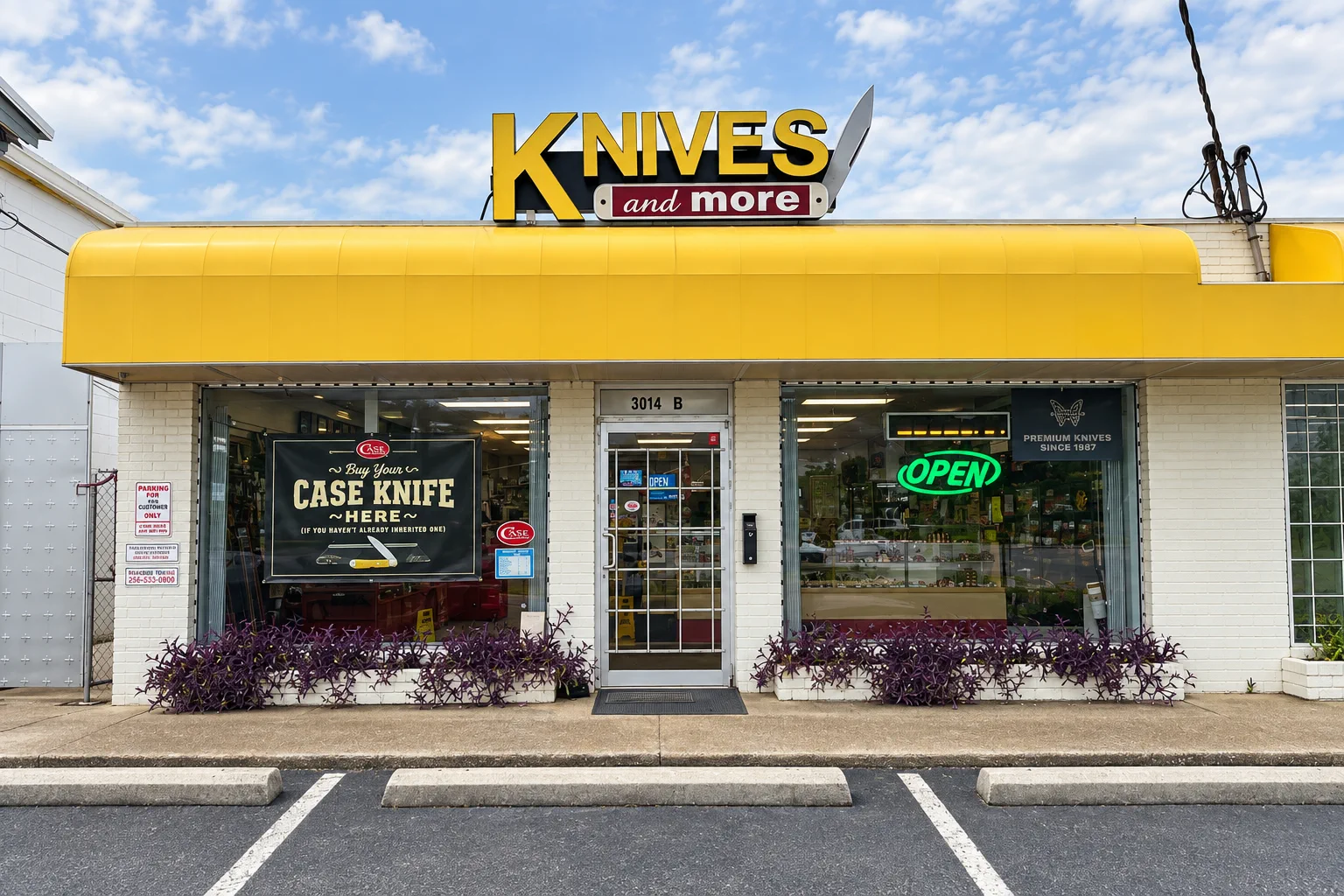 Clean exterior view of the Knives & More storefront at 3014 University Drive NW in Huntsville